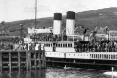 close-up of a busy Queen Alexandria arriving at Campbeltown in the 30s